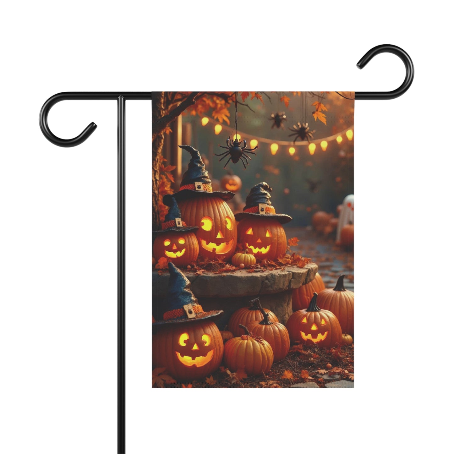Halloween garden flag with glowing jack-o'-lanterns, witch hats, spiders, and festive lights on an autumn background