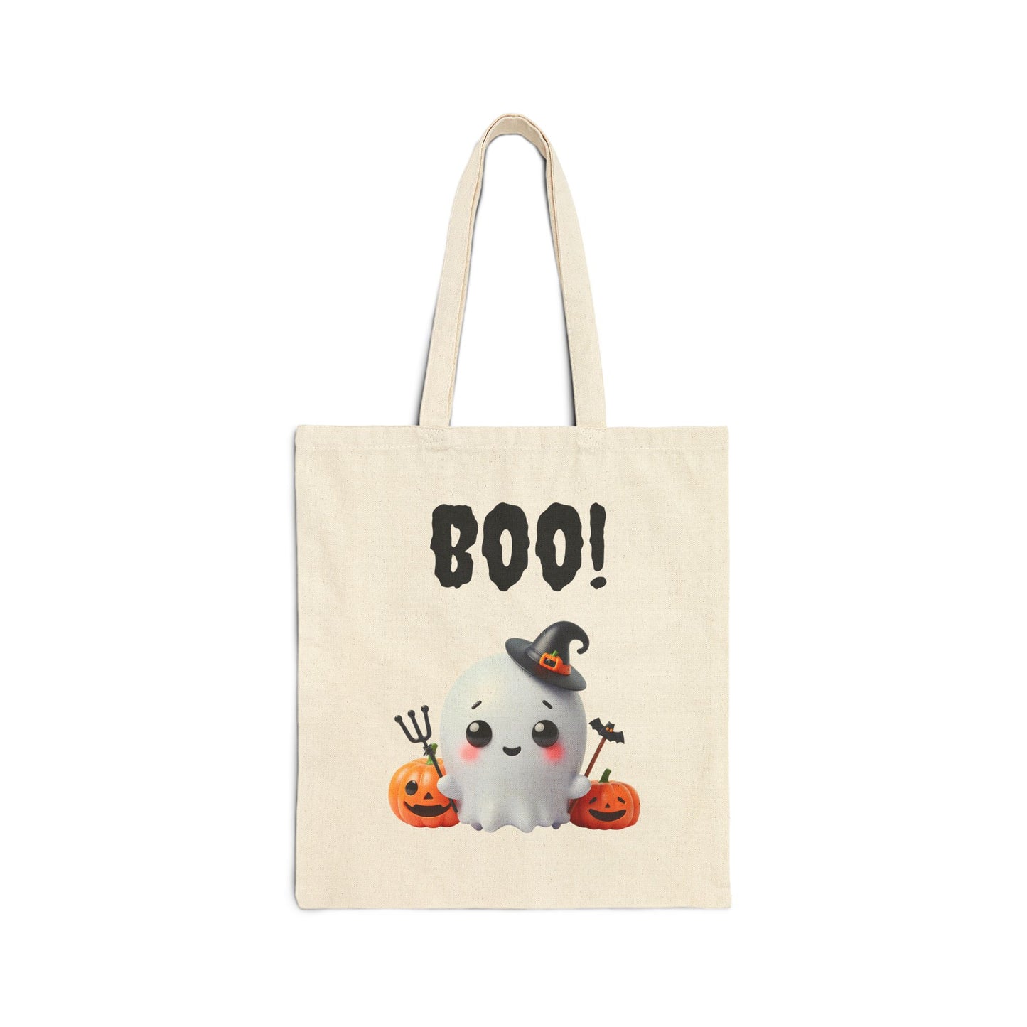 A cream-colored canvas tote bag featuring an illustration of a cute white ghost wearing a witch's hat and sitting between two carved pumpkins. The word "BOO!" is printed in a spooky font above the ghost.