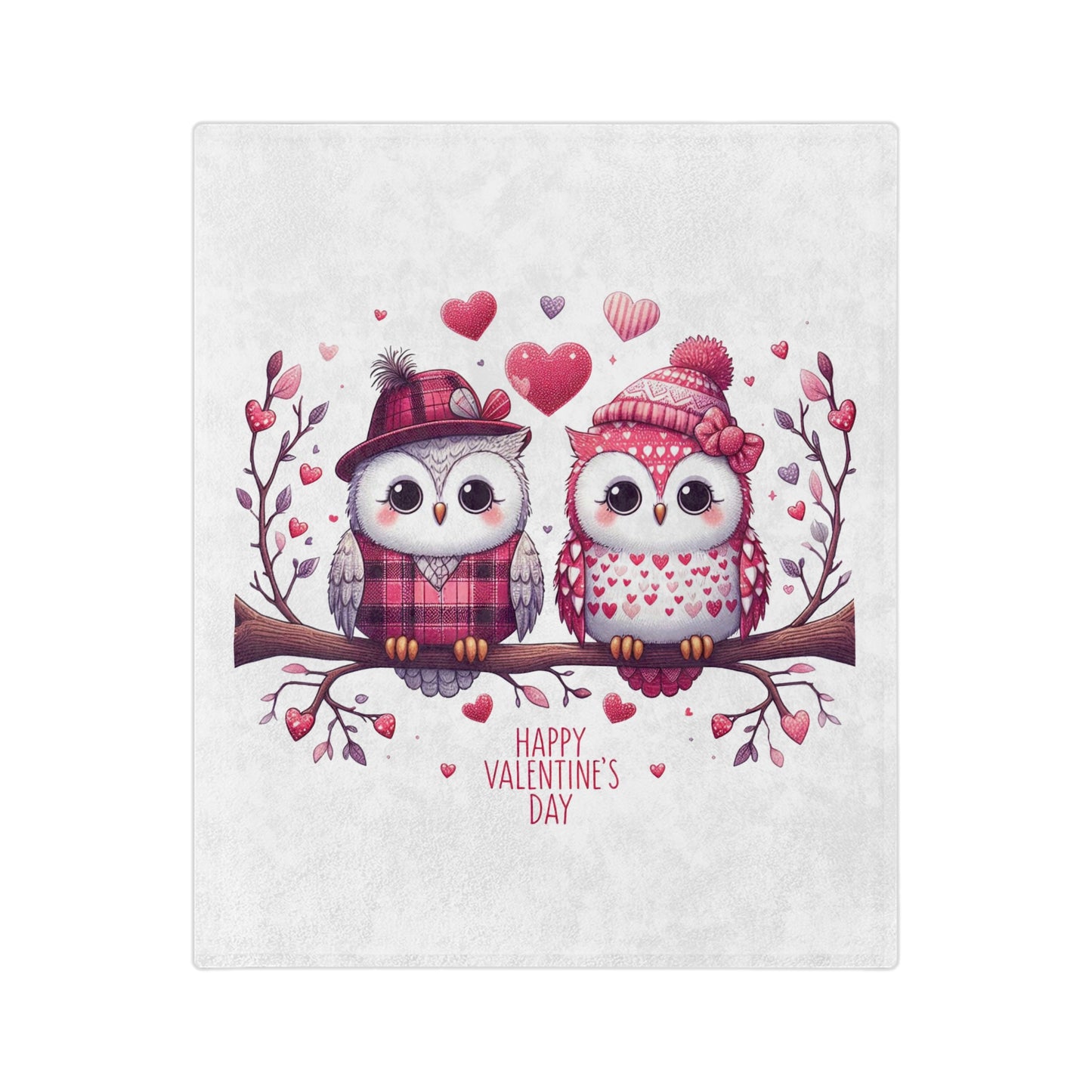 Lightweight white velveteen blanket with a charming illustration of two cartoon owls wearing winter hats and scarves, sitting on a branch surrounded by hearts, and the text "Happy Valentine's Day."

