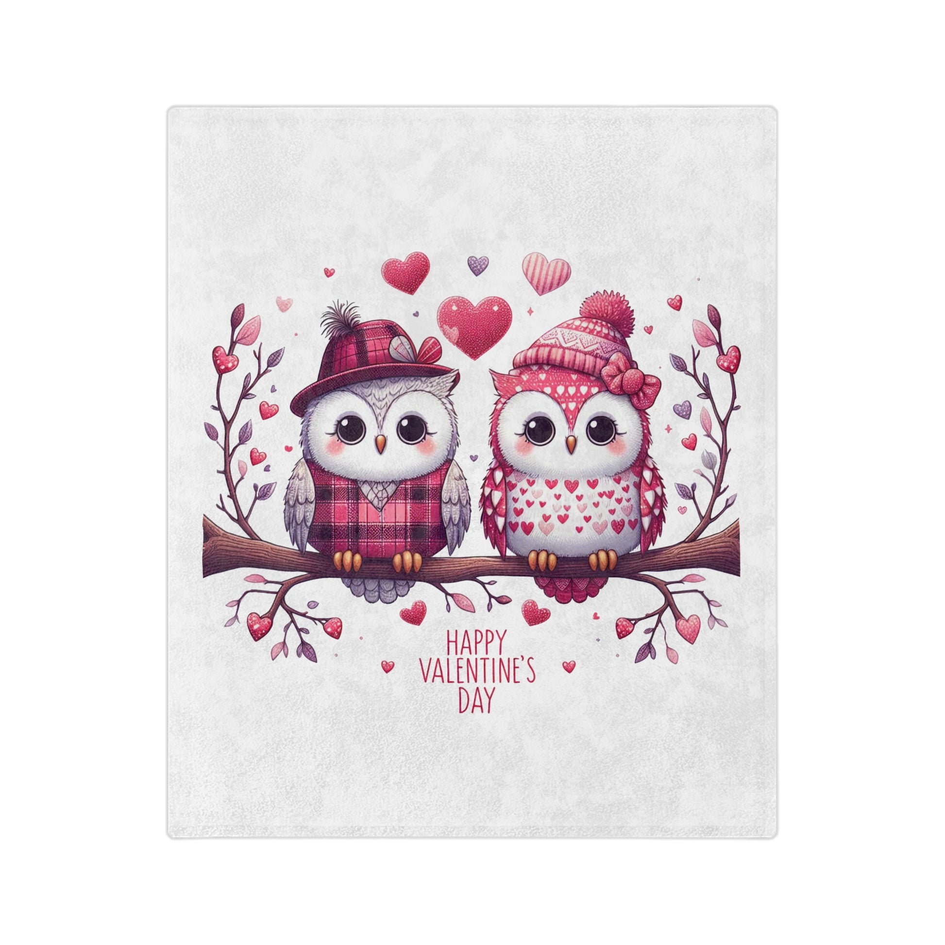 Lightweight white velveteen blanket with a charming illustration of two cartoon owls wearing winter hats and scarves, sitting on a branch surrounded by hearts, and the text "Happy Valentine's Day."

