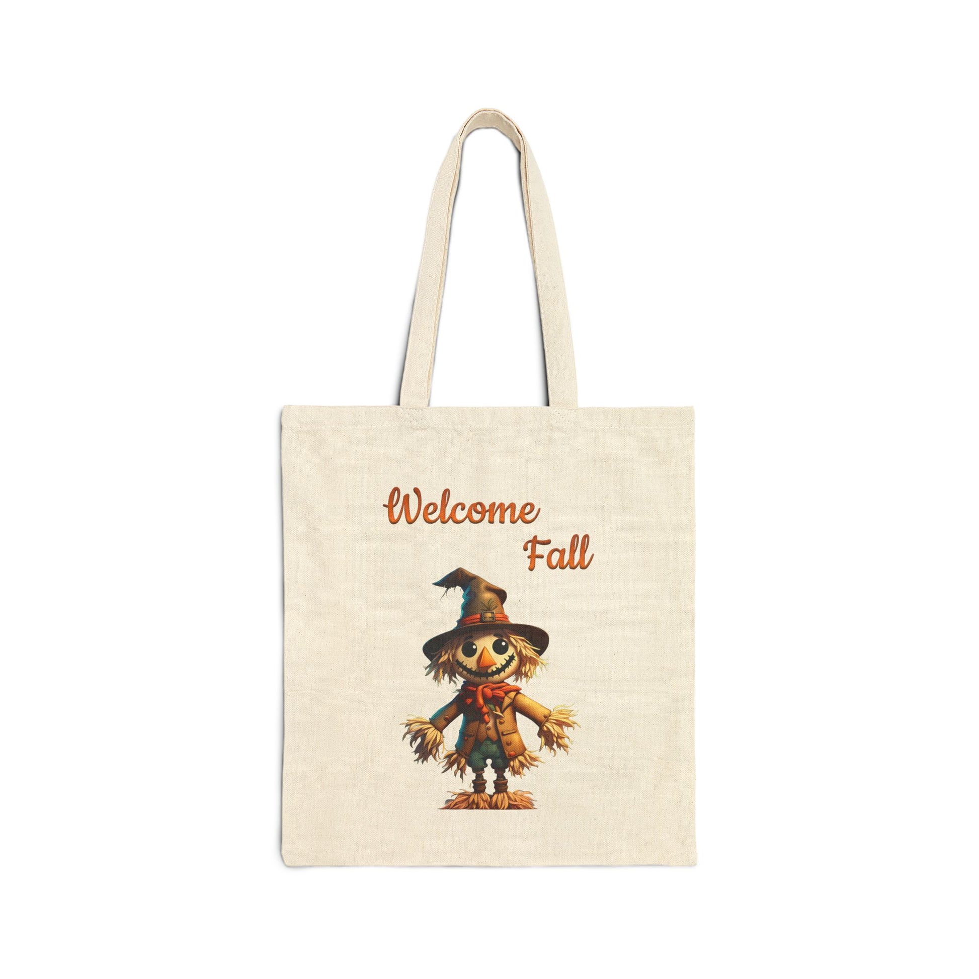 Welcome Fall canvas tote bag featuring a cute cartoon scarecrow with a patched hat and the text "Welcome Fall"
