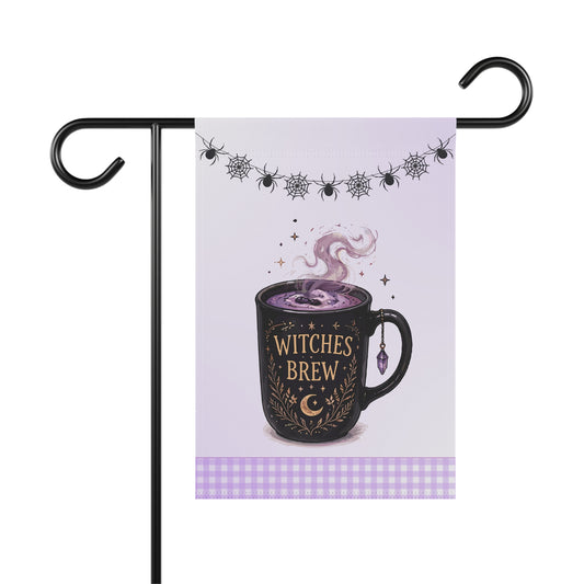 Whimsical Halloween garden flag featuring a black mug labeled Witches Brew with a gold crescent moon, filled with steaming purple liquid and topped by a spiderweb banner with a purple gingham bottom border.
