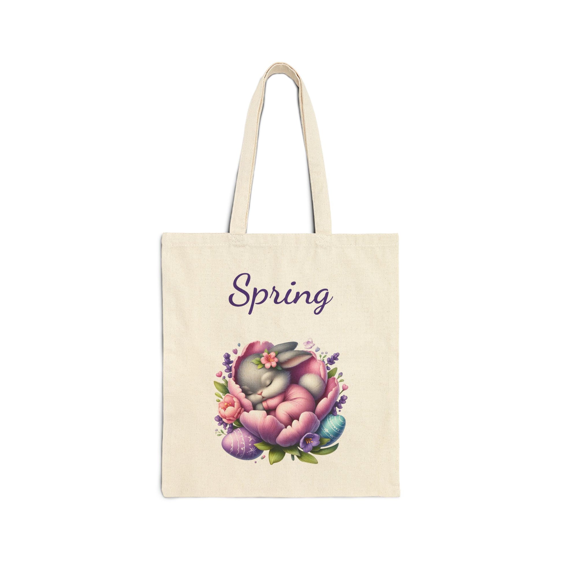 Canvas tote bag with a "Spring" print featuring a cute sleeping bunny in a floral nest with Easter eggs.