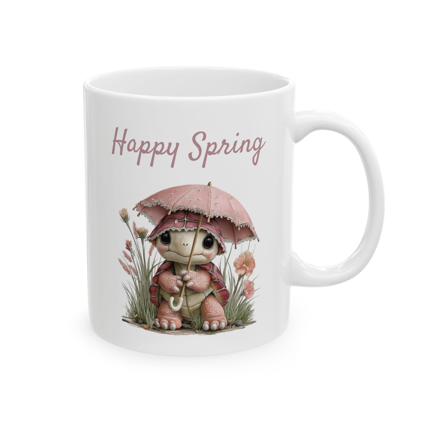 White ceramic coffee mug printed with pink Happy Spring text and a cute pink turtle under a lace umbrella