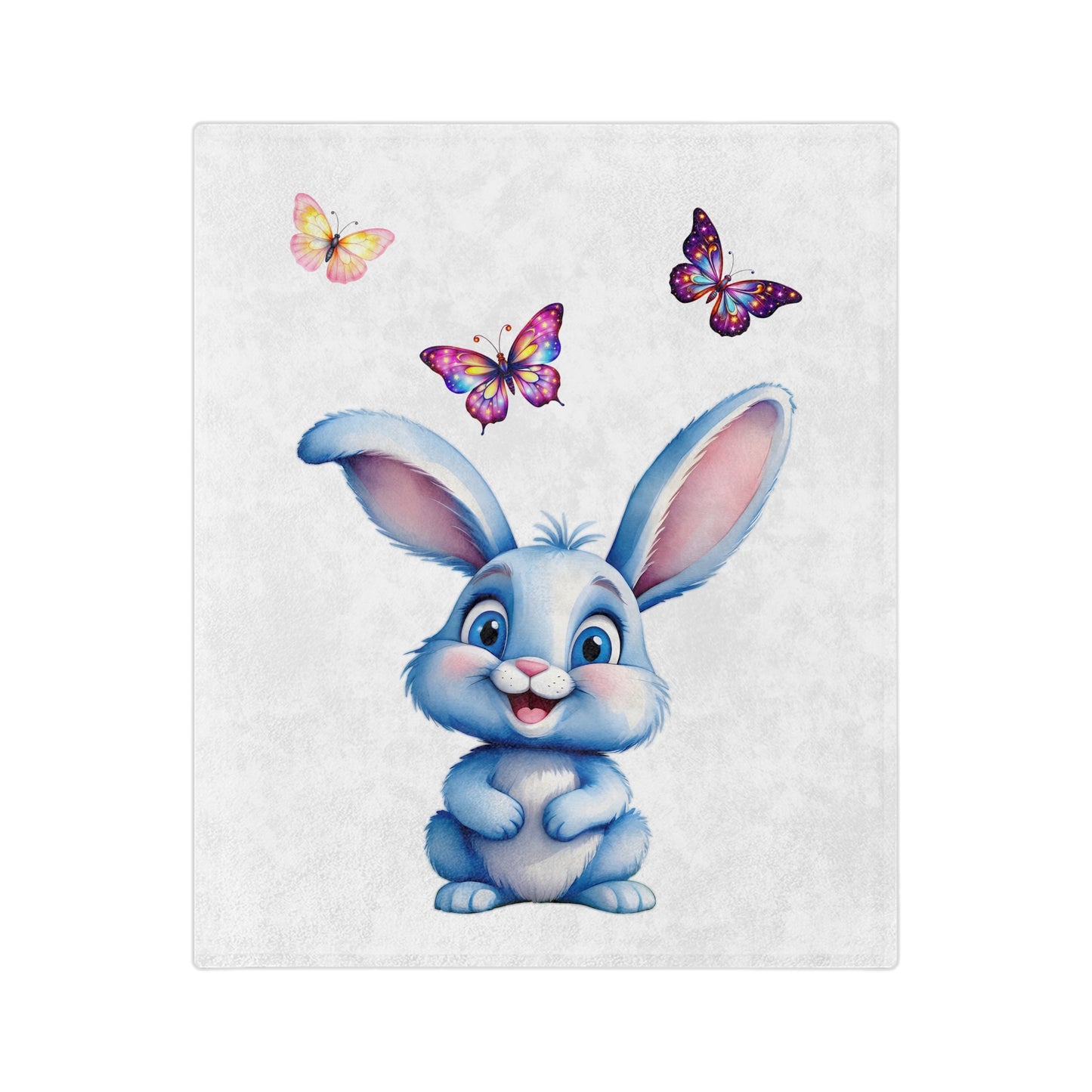 Lightweight white velveteen blanket with a central illustration of a cute blue cartoon bunny rabbit smiling with big eyes, and three colorful butterflies flying above it.

