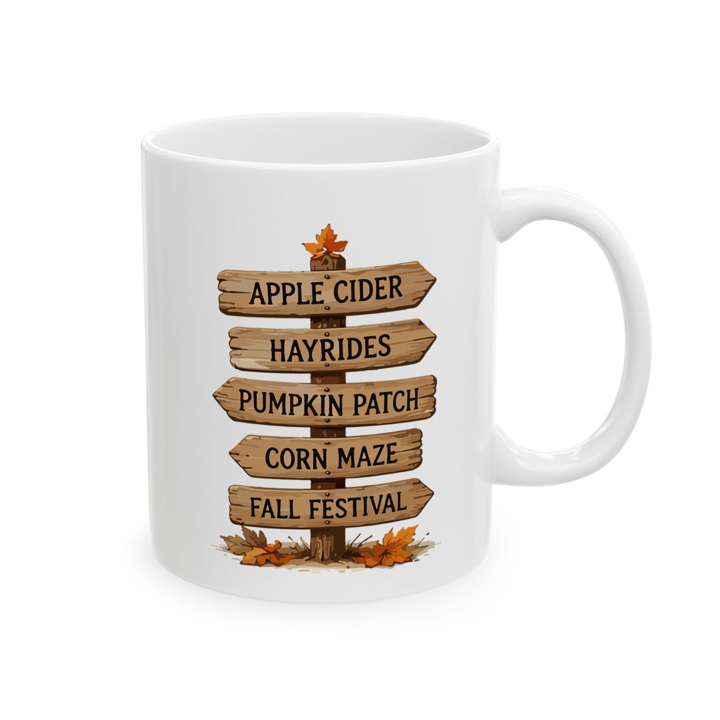 White ceramic coffee mug featuring an illustration of a rustic wooden directional signpost pointing toward apple cider, hayrides, pumpkin patch, corn maze, and fall festival.
