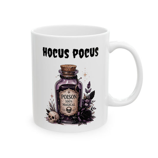 White ceramic coffee mug featuring an illustrated purple potion bottle labeled POISON 100% MAGICAL with a skull, surrounded by dark purple roses and a small skull under the black script text HOCUS POCUS.
