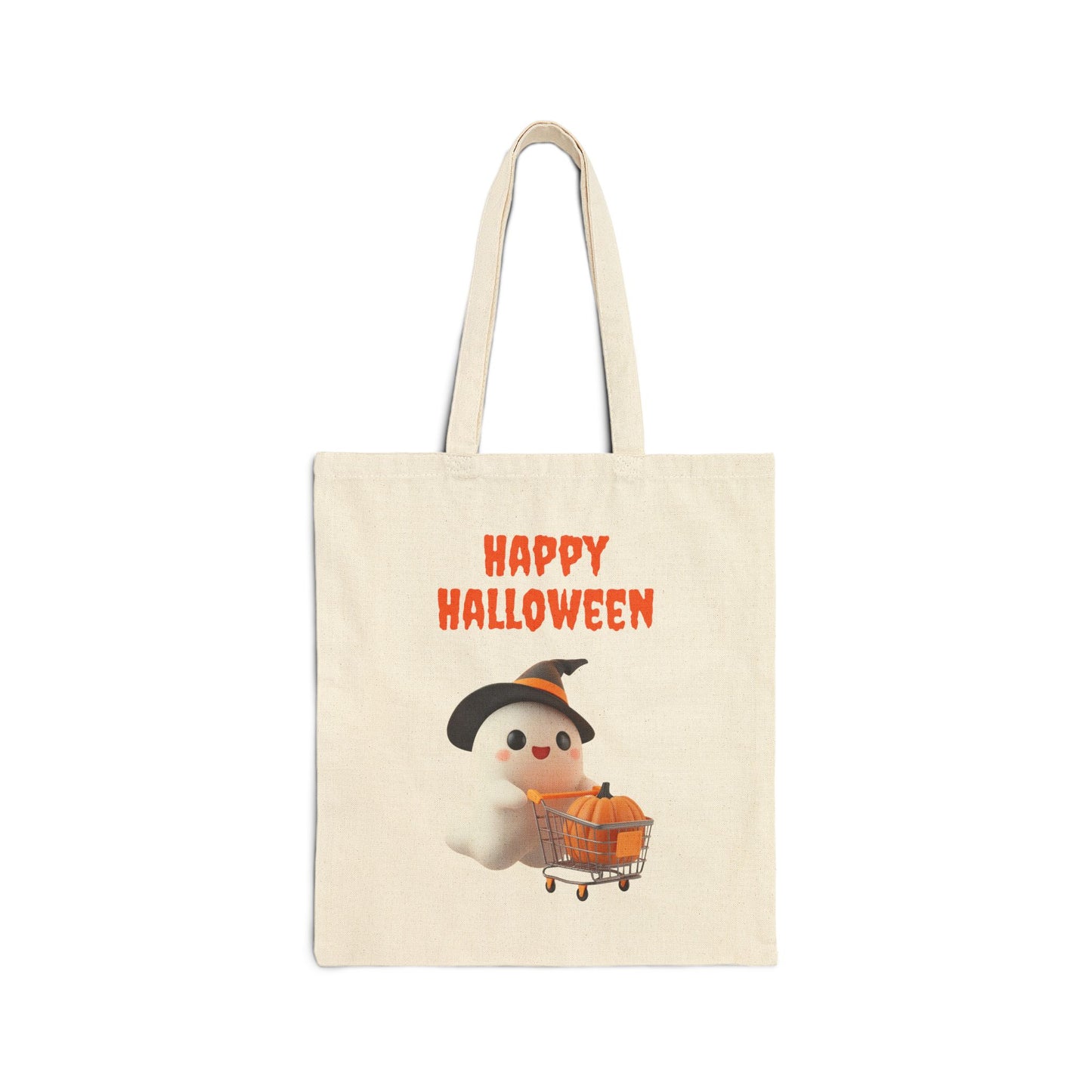 A cream-colored 100% cotton canvas tote bag featuring an illustration of a cute white ghost wearing a witch's hat and pushing a tiny shopping cart with a pumpkin inside. The text "HAPPY HALLOWEEN" is printed above the ghost.