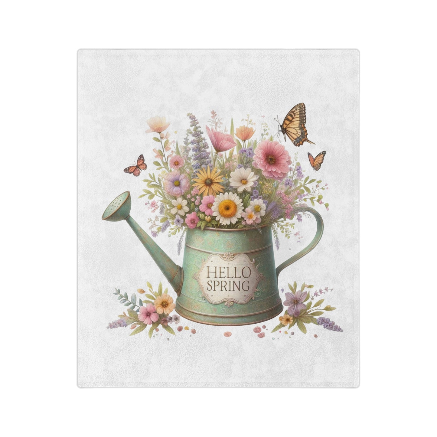 A soft "Hello Spring" velveteen blanket featuring a watercolor illustration of a watering can filled with a bouquet of spring flowers and butterflies.