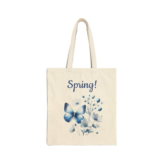 Elegant canvas tote bag with a blue butterfly and white floral print.