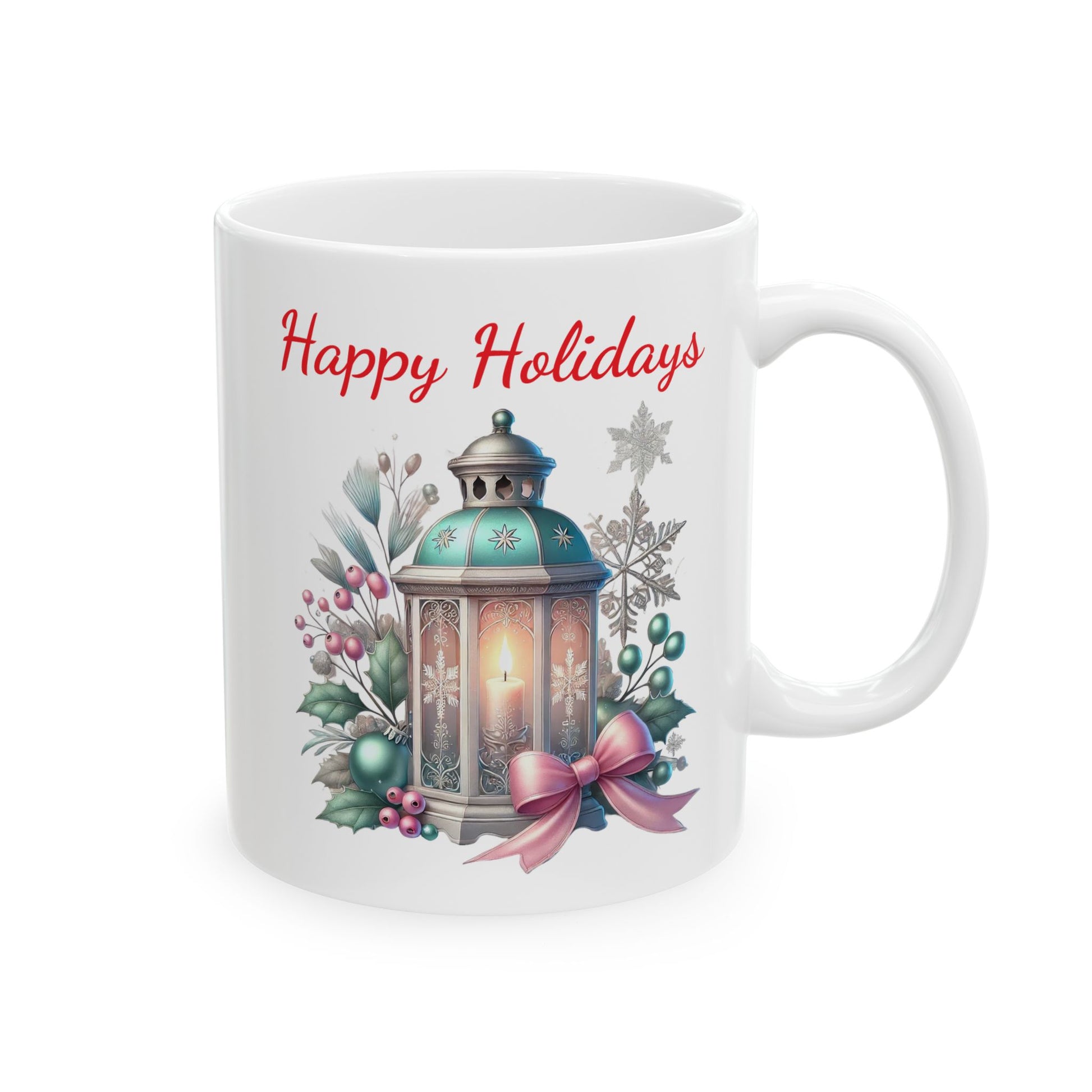 White ceramic coffee mug with a watercolor illustration of a lit teal holiday lantern surrounded by green leaves, red berries, silver snowflakes, and a pink bow, with red "Happy Holidays" text above.