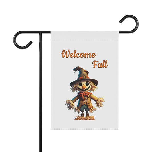 Welcome Fall garden flag with a smiling scarecrow wearing a hat and scarf.

