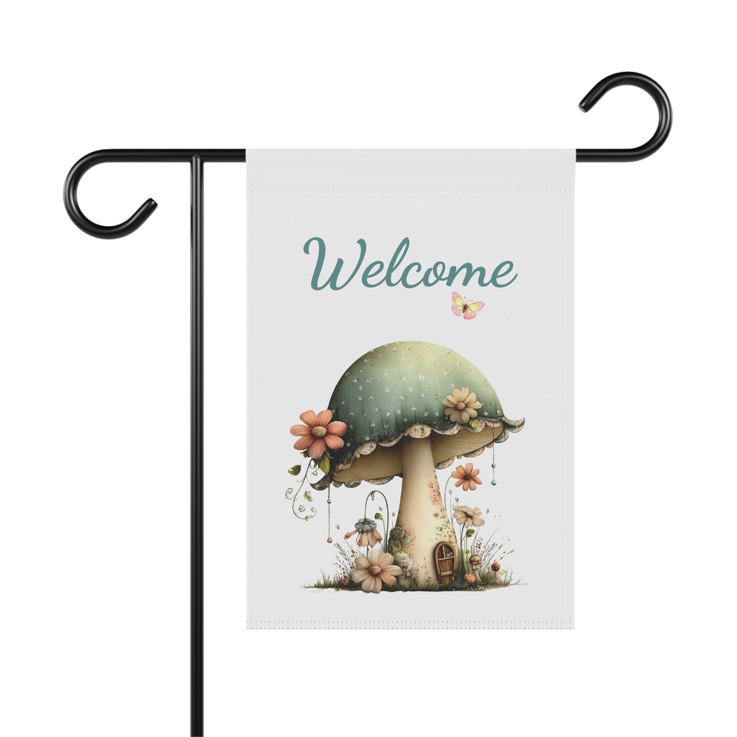 Garden flag on a black metal stand printed with teal script Welcome text above a fairy mushroom house surrounded by flowers and a butterfly
