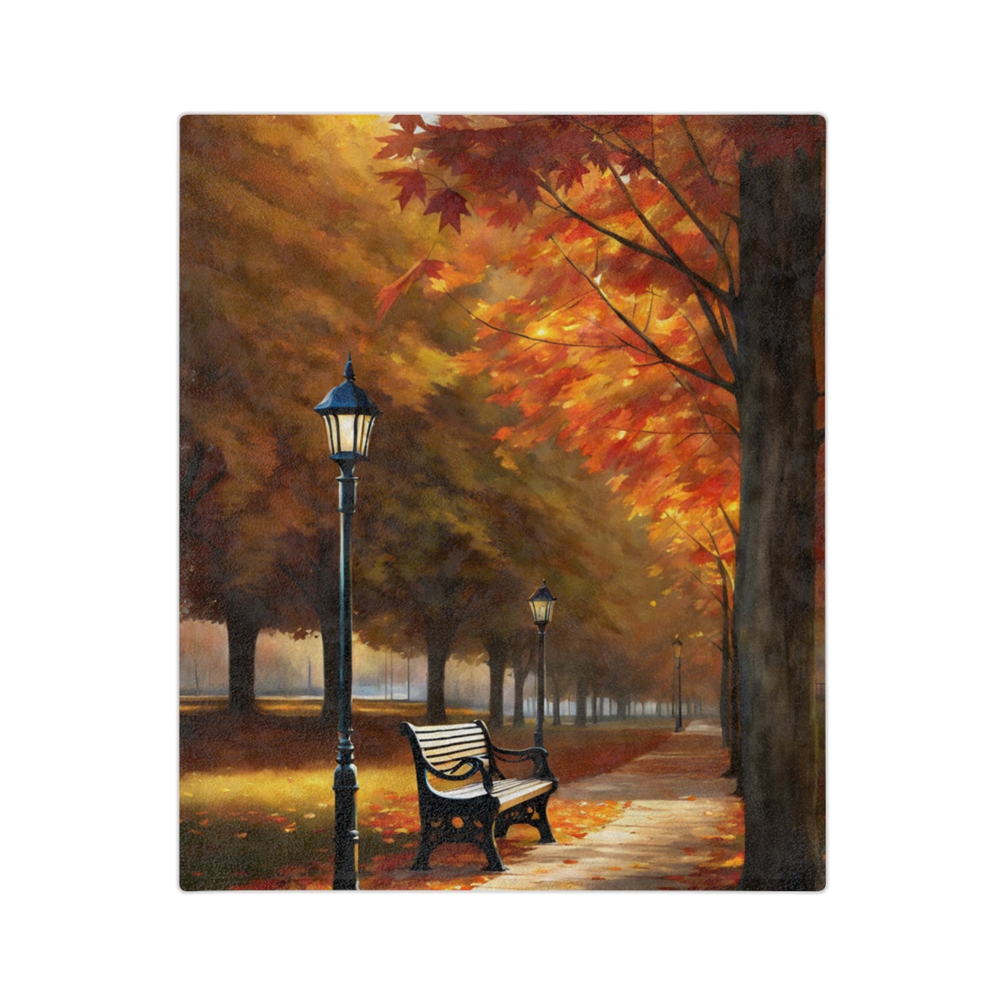 Lightweight velveteen blanket depicting an autumn park promenade with a path, a prominent black streetlamp, a park bench, and an avenue of trees in vibrant orange and red fall foliage.

