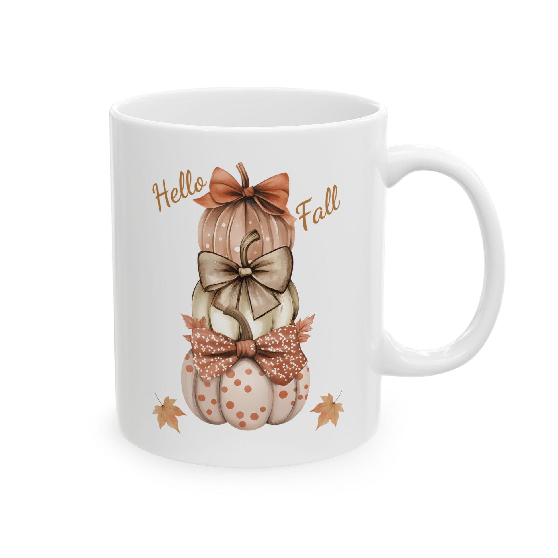 White ceramic coffee mug with a watercolor illustration of three stacked pumpkins in fall colors, each with a decorative bow and dot patterns, with "Hello Fall" text and fall leaves.