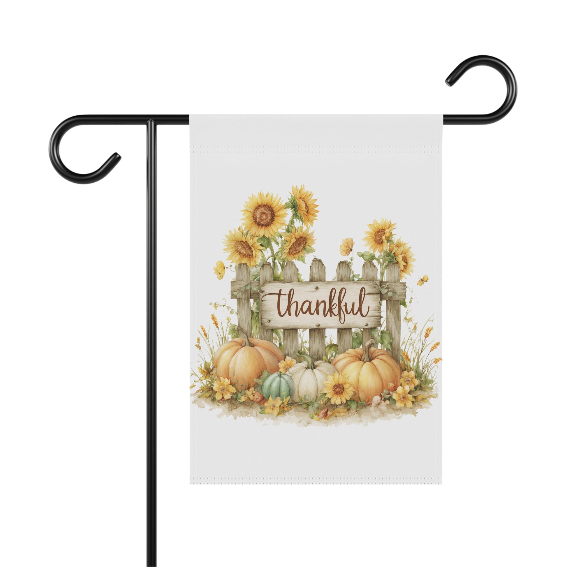 Golden sunflowers blooming over a rustic wooden fence with pumpkins and script Thankful text garden flag
