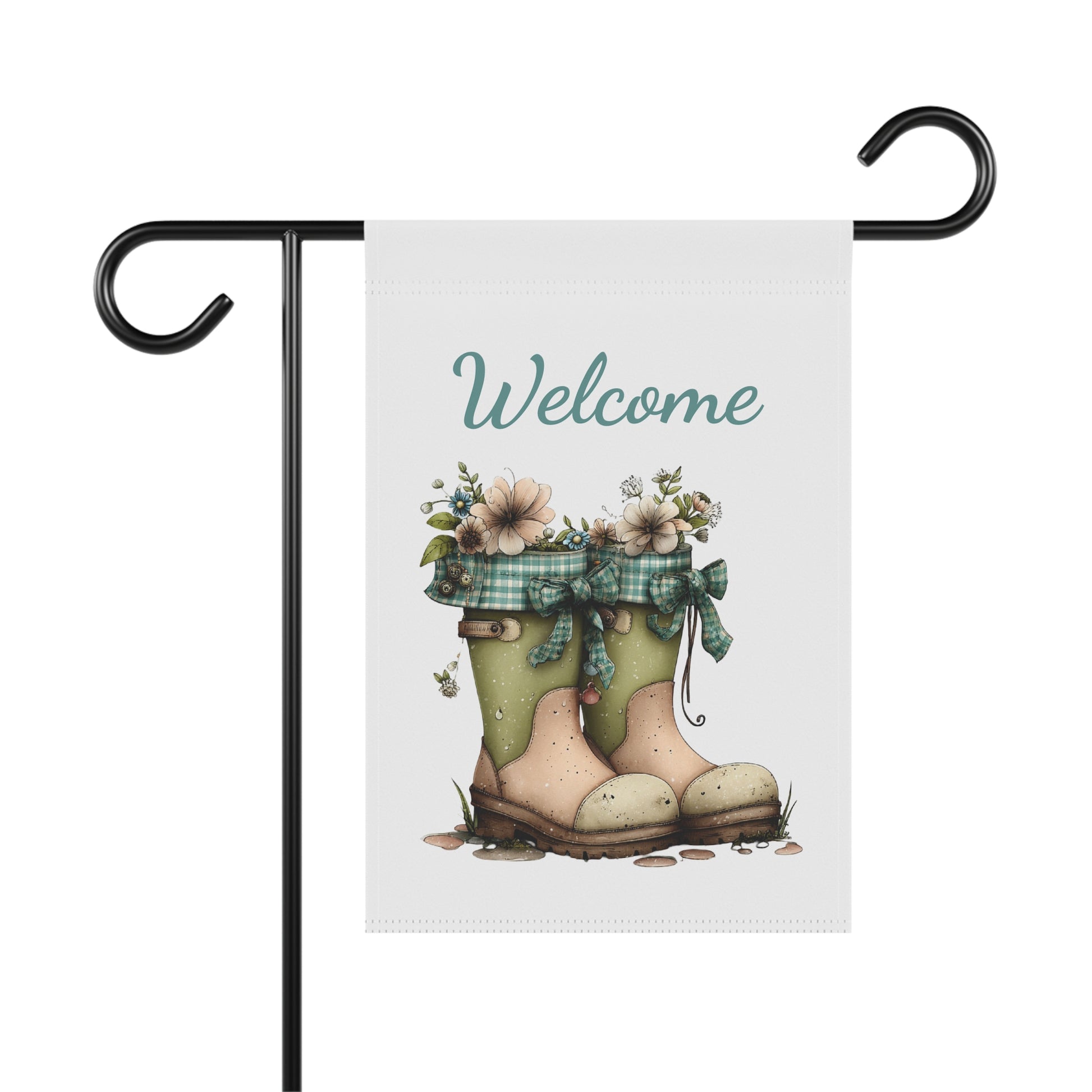 Garden flag on a black metal stand printed with teal script Welcome text above a pair of garden boots filled with flowers