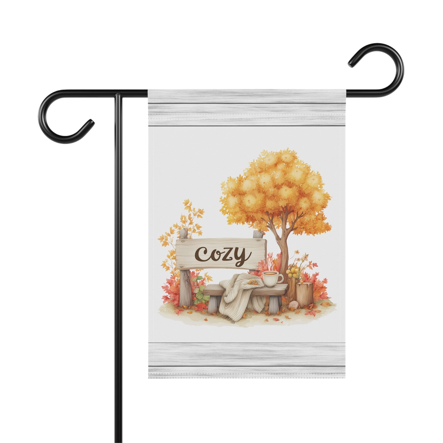 Cozy autumn scene with a park bench under a golden tree next to a wooden Cozy sign garden flag