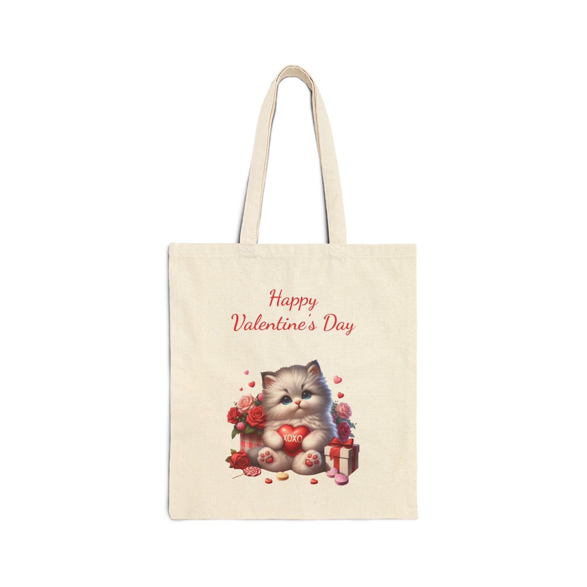 Canvas tote bag with a "Happy Valentine's Day" print featuring a cute kitten holding a heart, surrounded by roses and a gift box.

