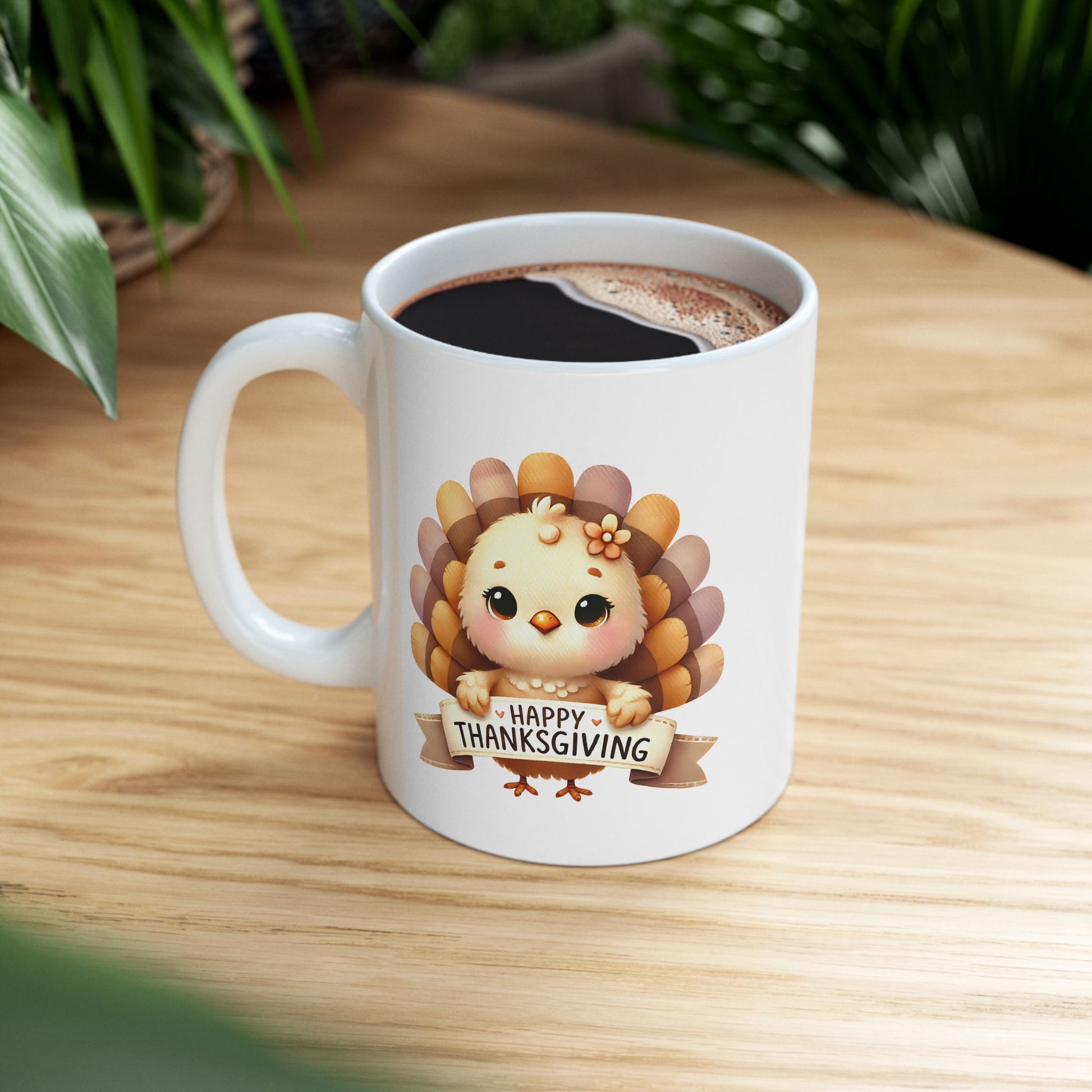 White ceramic coffee mug with a cute cartoon turkey holding a brown banner that reads 'Happy Thanksgiving', against a plain background.
