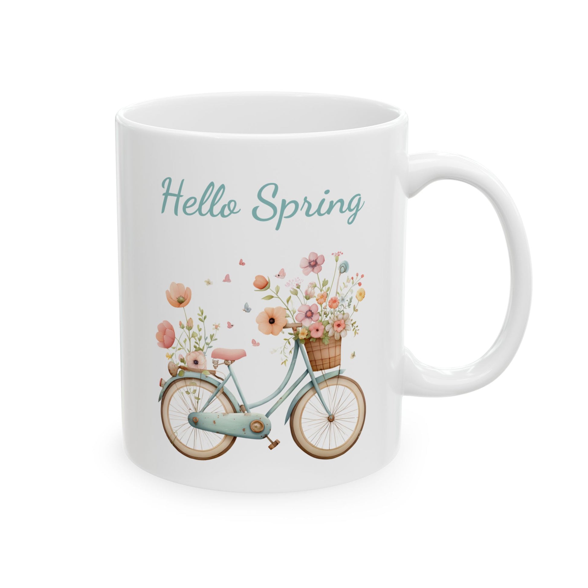 Pastel teal vintage bicycle overflowing with spring flowers and cursive Hello Spring text ceramic coffee mug