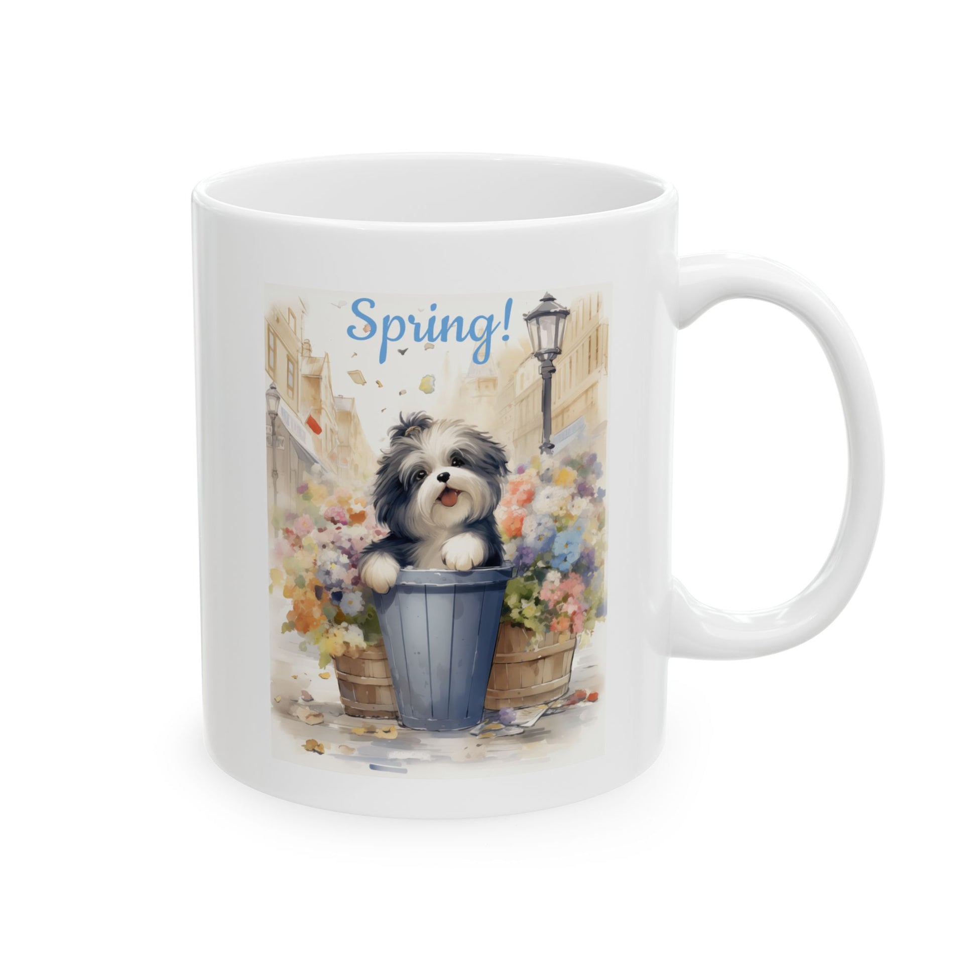 Front view of a white ceramic coffee mug featuring a cute, watercolor-style illustration of a black and white dog in a flower planter, with the text "Spring!".
