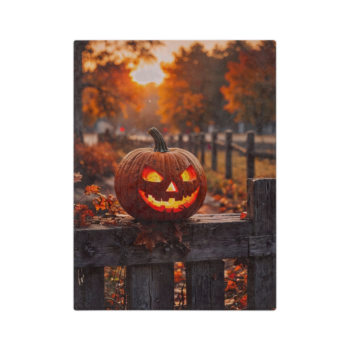 Rustic Autumn Jack-o'-Lantern Fence Halloween Plush Blanket with a glowing pumpkin on a wooden fence, surrounded by fall leaves with an autumn sunset in the background.

