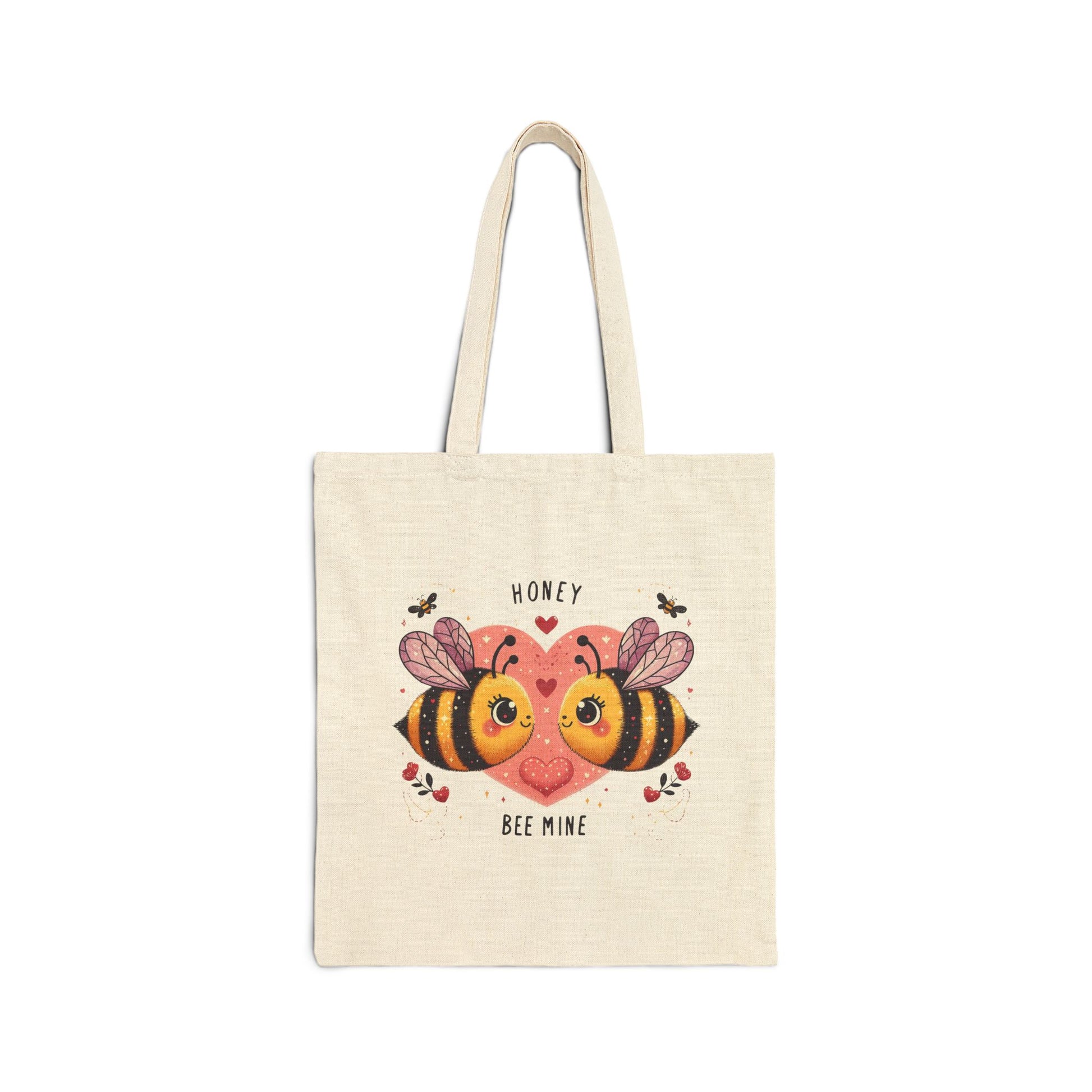 Canvas tote bag with a "Honey Bee Mine" print featuring two cute honey bees and a large pink heart.

