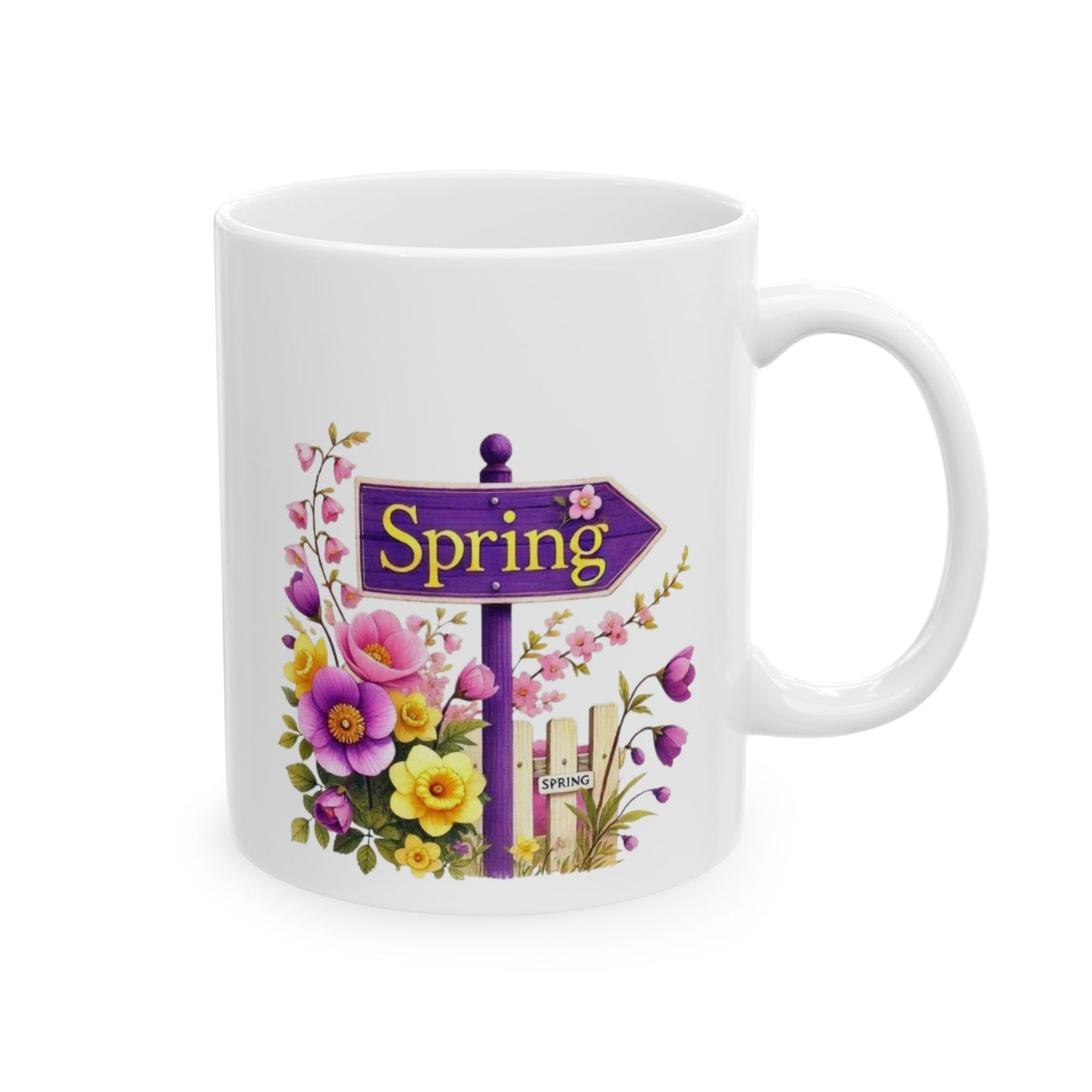 Spring ceramic coffee mug featuring an illustration of a purple wooden directional sign with yellow text reading Spring, surrounded by a lush bouquet of pink, purple, and yellow flowers next to a picket fence.