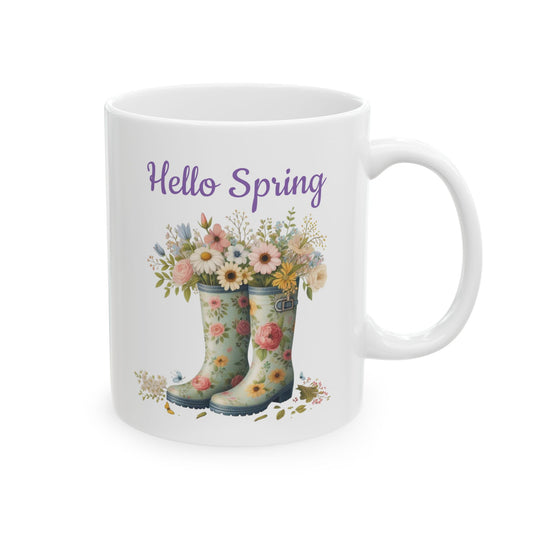 White mug with floral design and 'Hello Spring' text on a white background