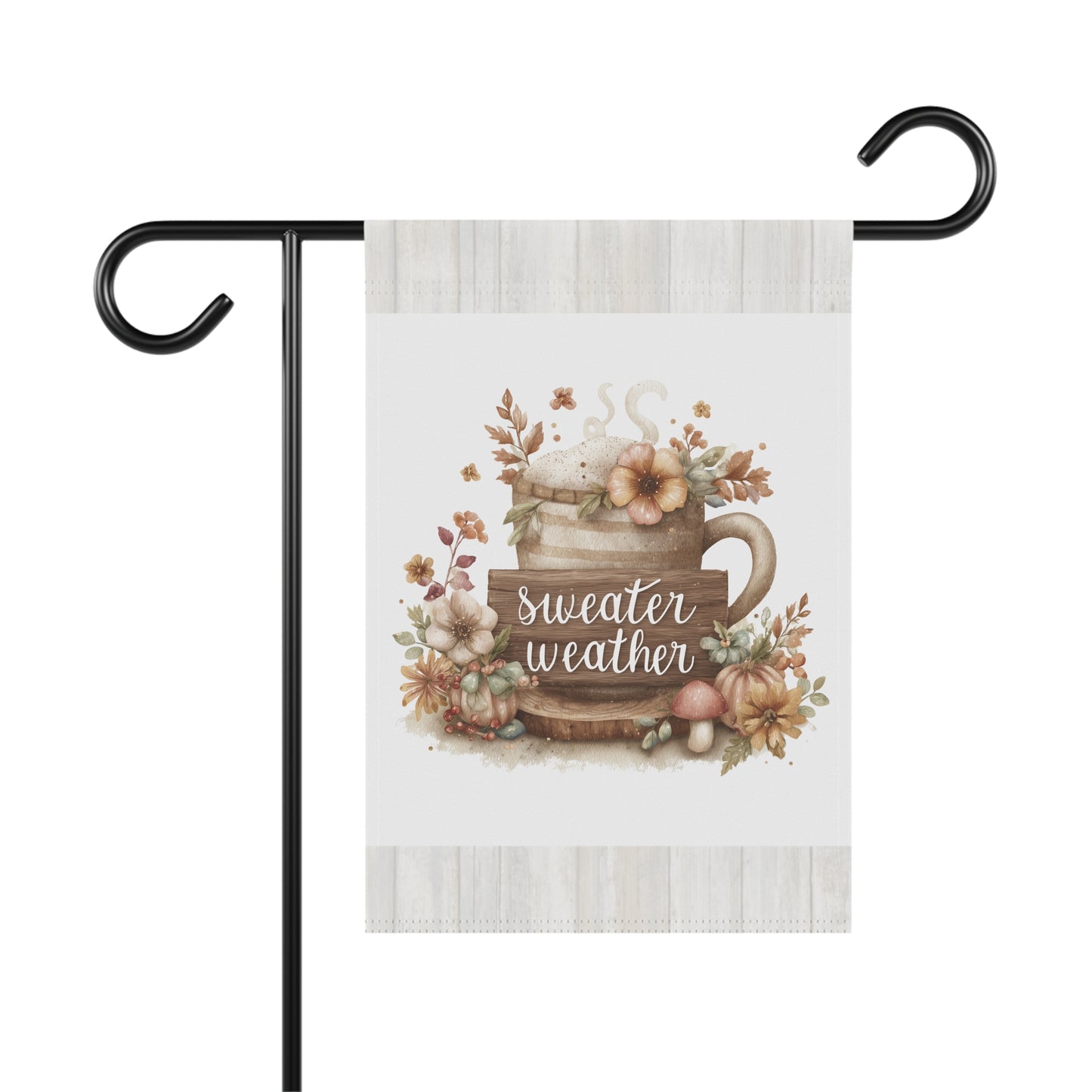 Cozy rustic warm drink mug surrounded by autumn flowers and pumpkins under Sweater Weather text garden flag