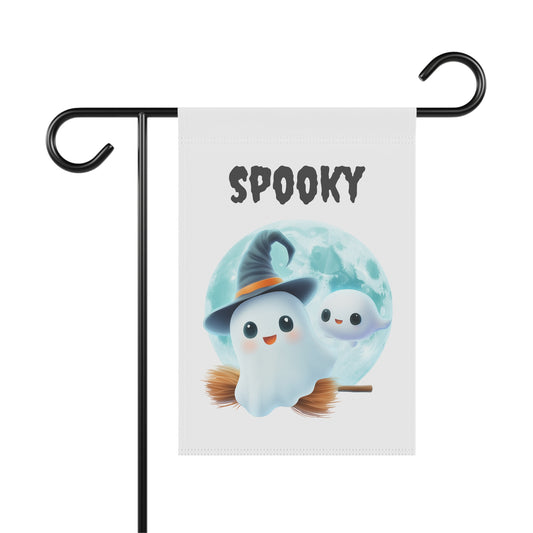 Cute ghost wearing a witch hat riding a broomstick with a small ghost and full moon below Spooky text on a white garden flag, White Halloween garden flag on a metal stand featuring cute broom-riding ghosts and full moon artwork, Cute ghost witch full moon garden flag for Halloween outdoor front porch and yard decor