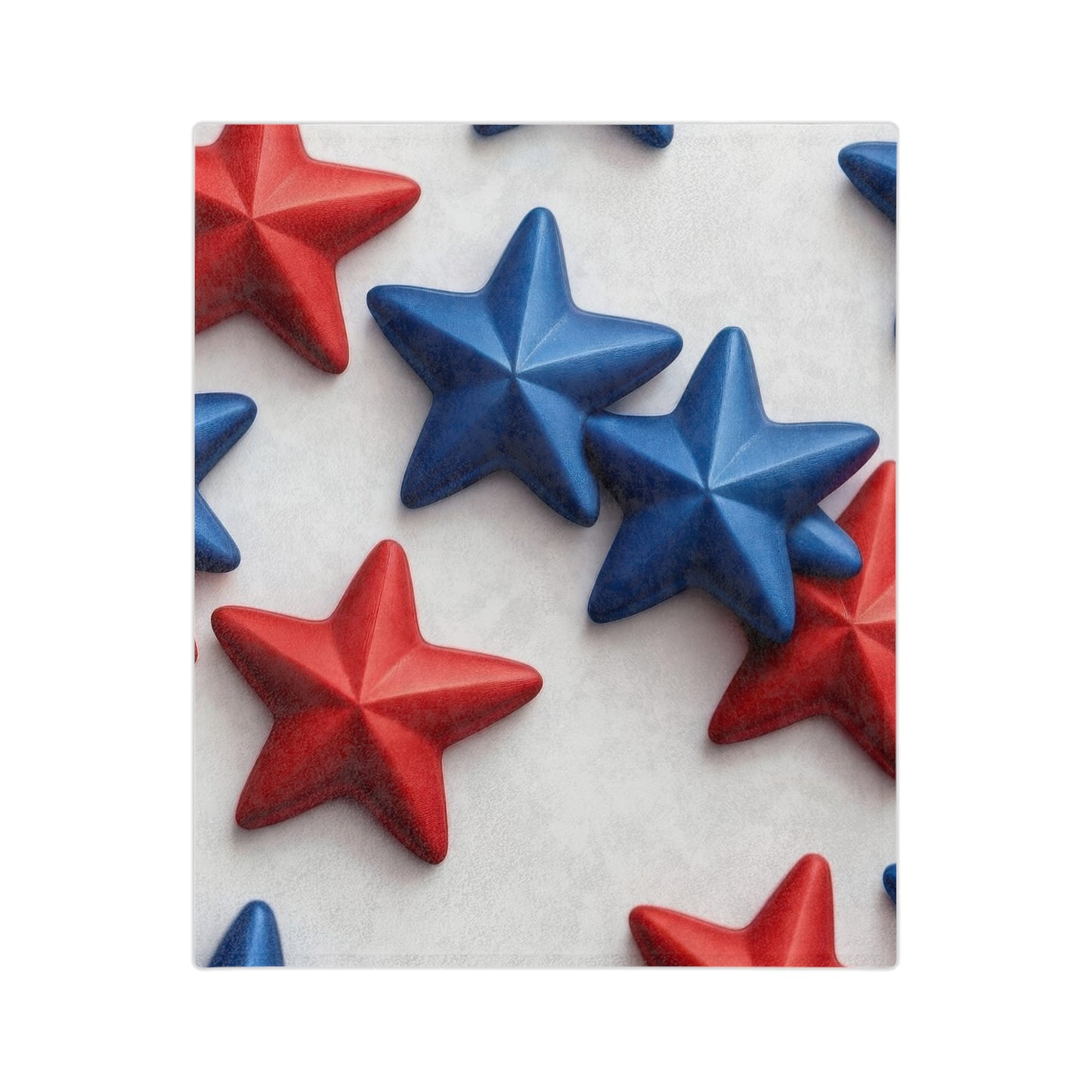 Velveteen plush blanket with red and blue three-dimensional stars on a white background for patriotic 4th of July décor