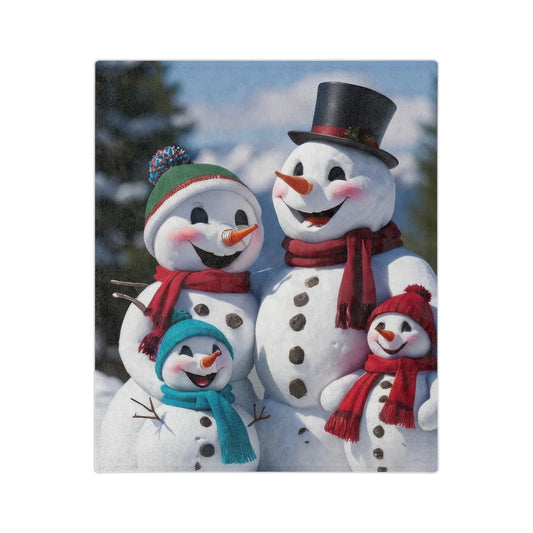 Christmas blanket with snowman family wearing scarves and hats, standing in snowy landscape