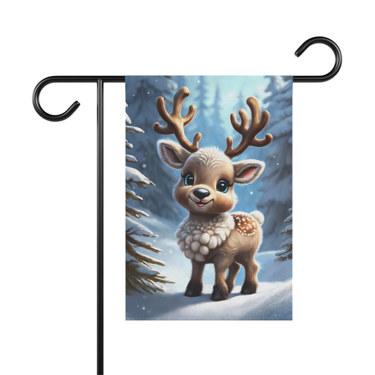 Cute cartoon baby reindeer garden flag with a fluffy white collar, spots, and large eyes, standing in a snowy forest with falling snow, festive holiday outdoor decor.

