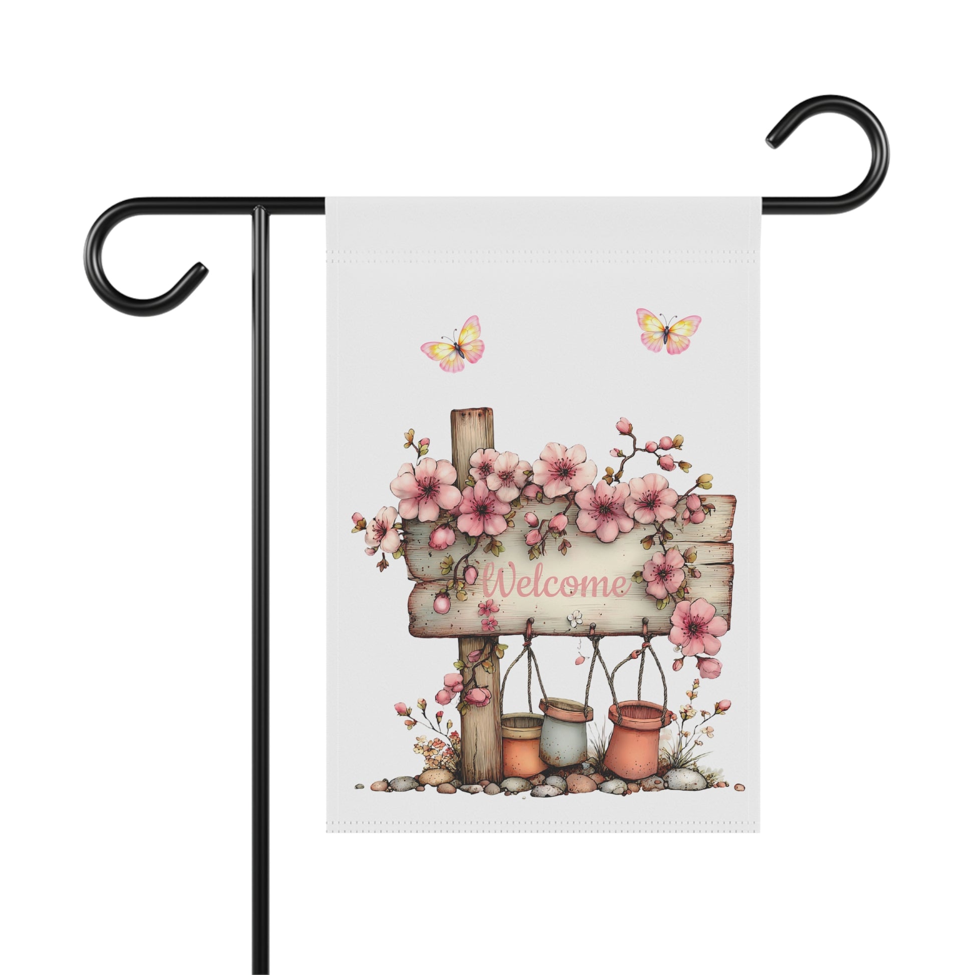 Spring garden flag featuring a rustic wooden Welcome sign draped in pink cherry blossoms with small hanging pots and yellow butterflies flying above.