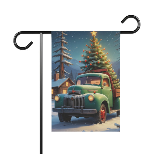 Vintage green pickup truck garden flag with Christmas tree in snowy landscape, classic holiday decor, winter scene, cabin, pine trees.

