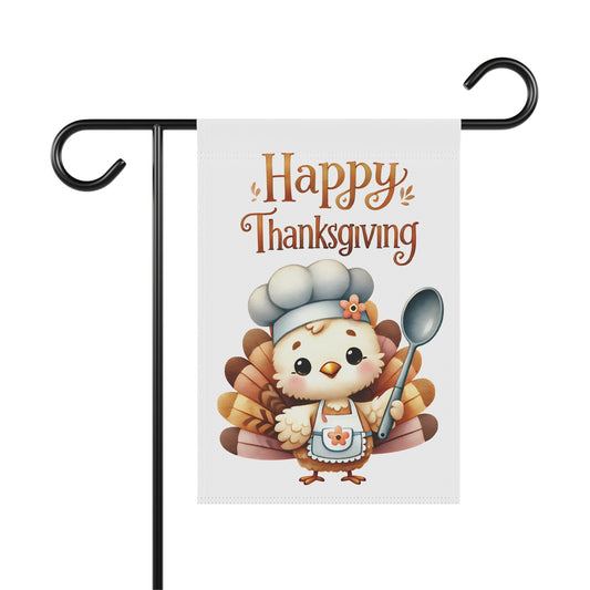 Thanksgiving garden flag with baby turkey chef holding spoon and wearing a hat and apron