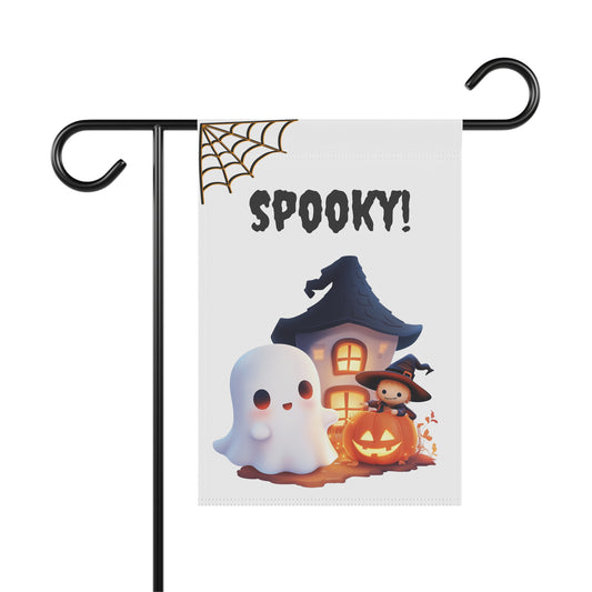 Cute ghost standing next to a glowing haunted house and pumpkin with Spooky! text and spiderweb on a garden flag, Outdoor Halloween garden flag on a metal stand featuring cute ghost haunted house and jack-o'-lantern artwork with Spooky! lettering, Cute ghost and haunted house Halloween yard flag for outdoor front porch and garden decor