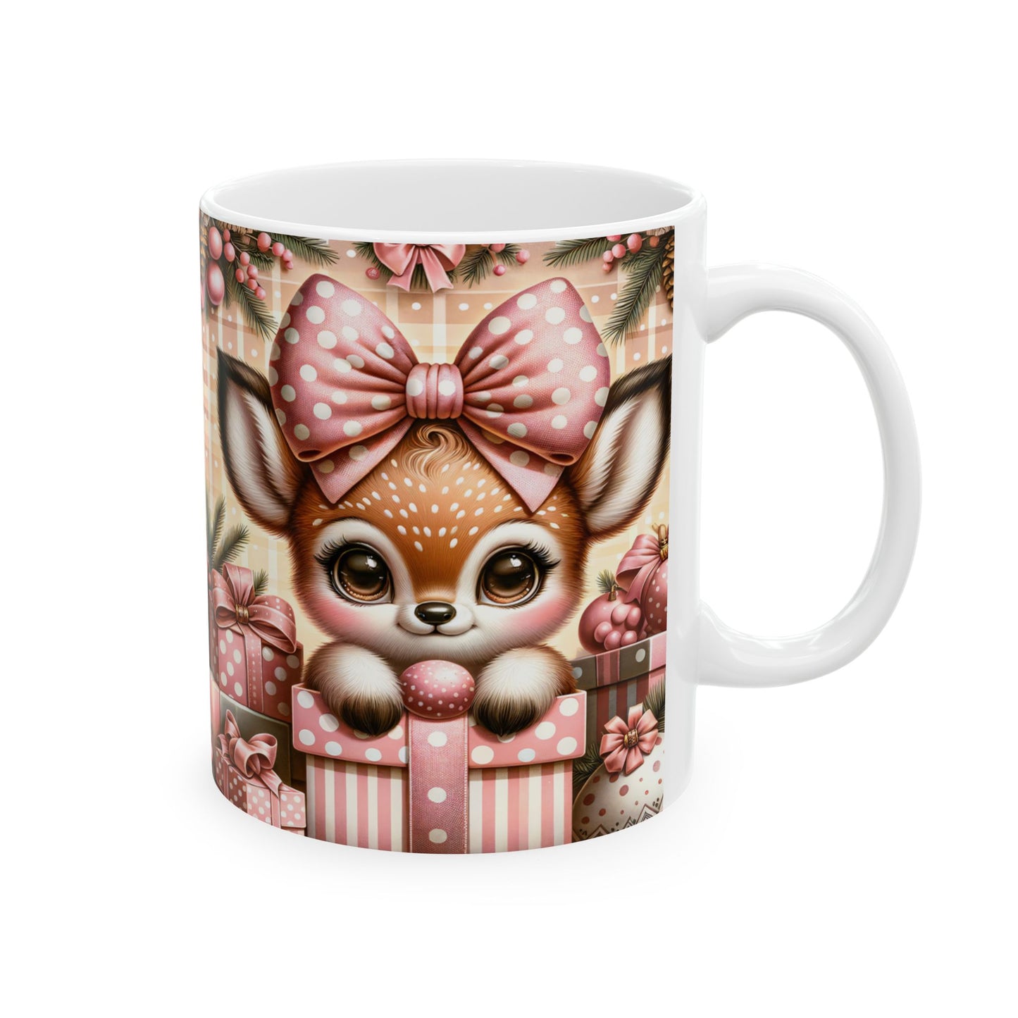 White ceramic coffee mug with a watercolor illustration of an adorable baby fawn with big eyes and a pink polka dot bow, peeking out of a pink striped gift box, surrounded by more gifts and subtle greenery.