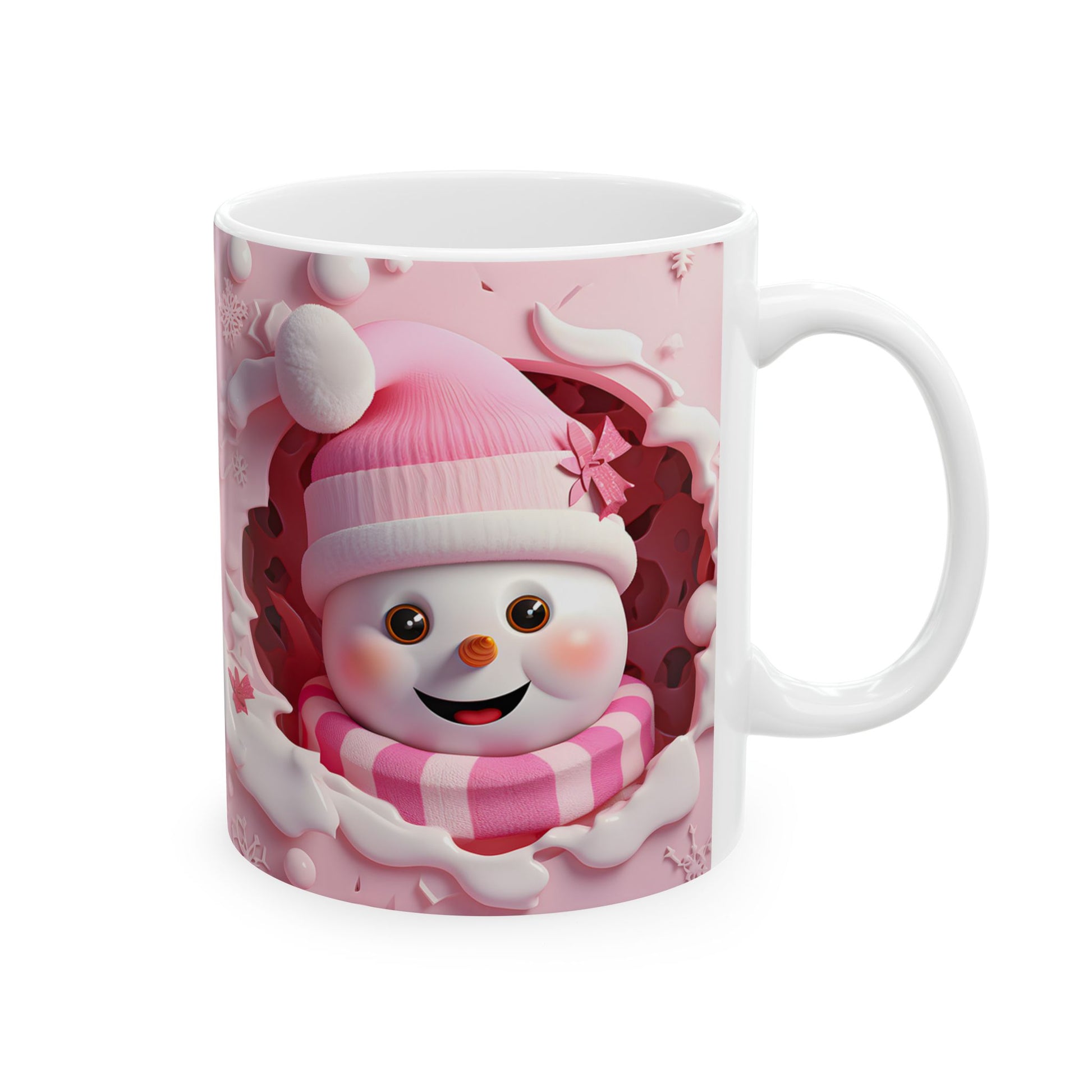 White ceramic coffee mug with a 3D-style illustration of a cute snowman wearing a pink striped hat and scarf, peeking out from a pink snowy background with snowflakes.