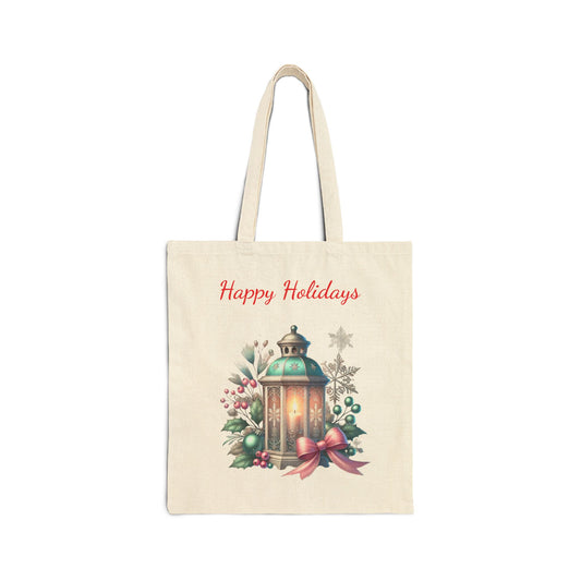 Happy Holidays tote bag featuring a glowing lantern, holly, berries, and a snowflake