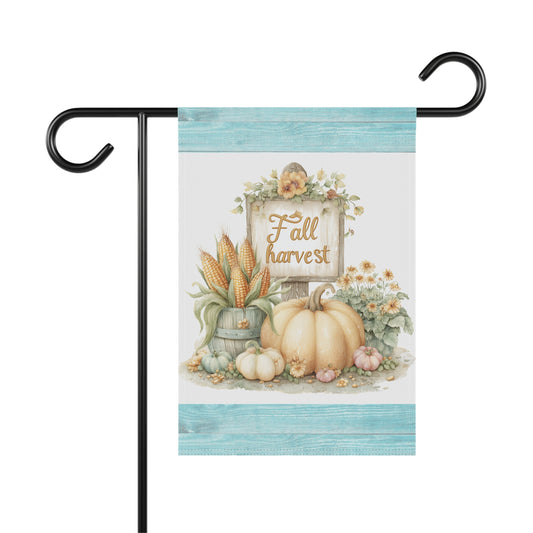 Whimsical autumn garden flag featuring a central Fall Harvest wooden sign, a large cream pumpkin, a bucket of corn ears, and yellow daisies framed by light teal blue wood grain borders at the top and bottom.