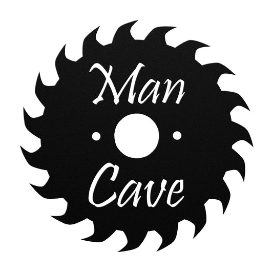 Black metal sign shaped like a circular saw blade with the words "Man Cave" in the center.